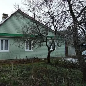 Продается половина дома в центре Кобрина 